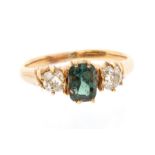 An antique Russian colour change alexandrite and diamond 15ct gold ring, the rectangular step cut