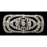 An Edwardian diamond set brooch, comprising an open geometric rectangular form set to the centre