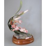 A Royal Worcester Ornamental Studio Orchid, 1983, Limited Edition of 150, number 49. With wooden