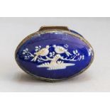 A Bilston deep blue enamel patch box, circa 1780, the cover with two love birds in raised white