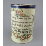 A late eighteenth century named and dated creamware mug, c.1791. It is decorated with floral motif