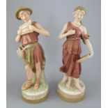 A pair of Royal Dux figures, early 20th Century, male and female musicians, No.2074 and 2075, pink