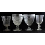 Four various 19th Century clear glass vases, one cut glass with star cut base, height 23cm, one