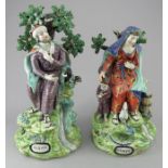 A pair of early nineteenth century pearlware Walton bocage figures, c.1810-20. They modelled and