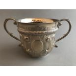 A George V Britannia silver two handled porringer, of 17th Century design, gadroon embossing.