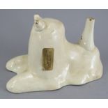 A fine late eighteenth century creamware jelly mould, c. 1790. It depicts a seated lion. 22 cm long.