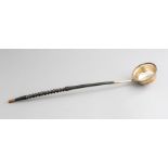 A silver punch ladle, turned whalebone handle, maker Hampton Utilities, Birmingham 1965 Condition: