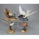 A group of Royal Crown Derby, Fine Bone China bird figures. To include: Robin, Thrush Chicks, Long-