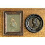 A 19th Century cast bronze profile portrait plaque of Napoleon, diameter 7cm,together with a profile