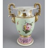 An early nineteenth century Masons porcelain two-handled vase, c.1825. It is hand-painted with