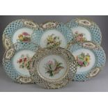 A series of late nineteenth century Minton hard paste ribbon cabinet plates, florally hand-painted