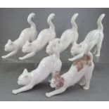 A group of six Albany Fine China Co. cats. One naturalistically decorated, five undecorated,