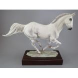 An Albany Fine China Co. model of Desert Orchid modeled by Lorne McKean on wooden base. Factory