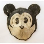 A circa 1930's child's Mickey Mouse face mask, moulded linen with painted features, height 22cm