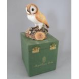 A Royal Crown Derby, Fine Bone China bird figure: Barn Owl. Including original hard-case. Factory