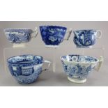 A group of early nineteenth century blue and white transfer-printed cups, c.1820-30. To include: