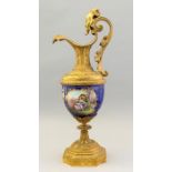 A 19th Century Paris porcelain ewer in a cast ormolu mount of Renaissance revival design, circa
