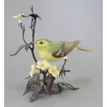 An Albany Fine China Co. ceramic bird study incorporating metal. Modelled as a Yellow Wagtail.
