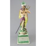 An early nineteenth century pearlware figure on square base of Neptune, c.1810-20. It is decorated