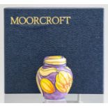 A Moorcroft miniature trial ginger jar and cover, height 5.5cm, boxed Condition: good overall