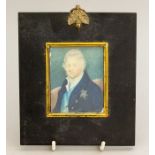 A Regency portrait miniature of William IV on ivory, half length wearing a blue tunic with