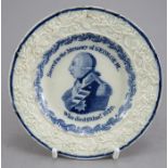 An early nineteenth century commemorative blue and white transfer-printed moulded child's plate, c.