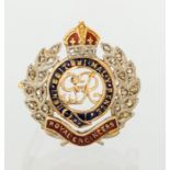 A 9ct rose gold and platinum George VI Royal Engineers brooch, diamond and enamel, height 2cm,
