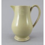 An early nineteenth century drabware Wedgwood sparrow-beak jug, c.1820. It is impressed WEDGWOOD