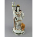 An early nineteenth century pearlware Staffordshire Pratt figure, c.1810. It is decorated in the