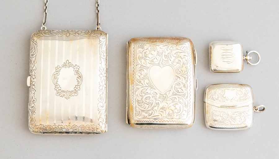 A sterling silver necessaire, incorporating a calling card division, sovereign holders and powder