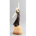 An Art Nouveau chryselephantine figurine, titled Boehme - a classically draped maiden with arms