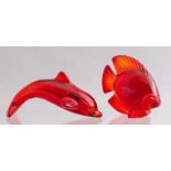 A Daum ruby glass fish paperweight and a similar dolphin paperweight, both signed, height of fish