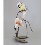 An Albany Fine China Co. ceramic bird study incorporating metal. Modelled as a Blue Tit. Factory