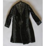 An Edwardian Black Italian coat, with embellished wide panels of woven decorative braidings, zig zag