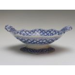 An early nineteenth century blue and white transfer printed Spode footed and handled large