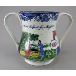 An early nineteenth century blue and white transfer-printed two-handled loving cup, c.1830. It is