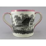 An early nineteenth century transfer-printed Sunderland lustre two-handle mug, c.1820-40. It is