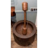 An 18th/19th Century giant carved oak mortar, height 50cm, diameter 70cm, with a similar giant