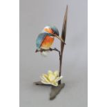 An Albany Fine China Co. ceramic bird study incorporating metal. Modelled as a Kingfisher. Factory