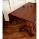 A Regency mahogany Pembroke table, circa 1820, two dropleaves opens up to a rectangular smooth