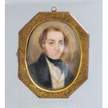 A mid 19th Century oval portrait miniature on ivory, circa 1850, young gentleman, bust length