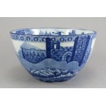 An early nineteenth century blue and white transfer-printed rural waste bowl, c.1825. It is