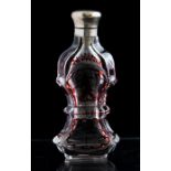 A late 19th Century Bohemian ruby flashed clear cut glass scent bottle, circa 1870, decorated with a