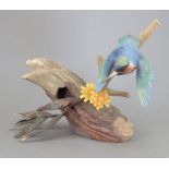 An Albany Fine China Co. ceramic bird study incorporating metal. Modelled as a Kingfisher. Factory