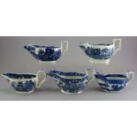 A group of early nineteenth century blue and white transfer-printed sauce boats, c.1800-20. To