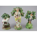 A group of early early nineteenth century Staffordshire bocage figures, c.1820-40. To include: a