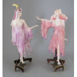 Two Albany Fine China Co. female figures in exotic dress incorporating a metal base. Factory mark to