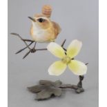 An Albany Fine China Co. ceramic bird study incorporating metal. Modelled as a Wren. Factory mark to