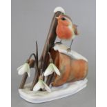 An Albany Fine China Co. ceramic bird study incorporating metal. Modelled as a Robin in the snow.