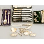 A mixed parcel of assorted silver flatware, boxed and unboxed, to include napkin rings, fruit